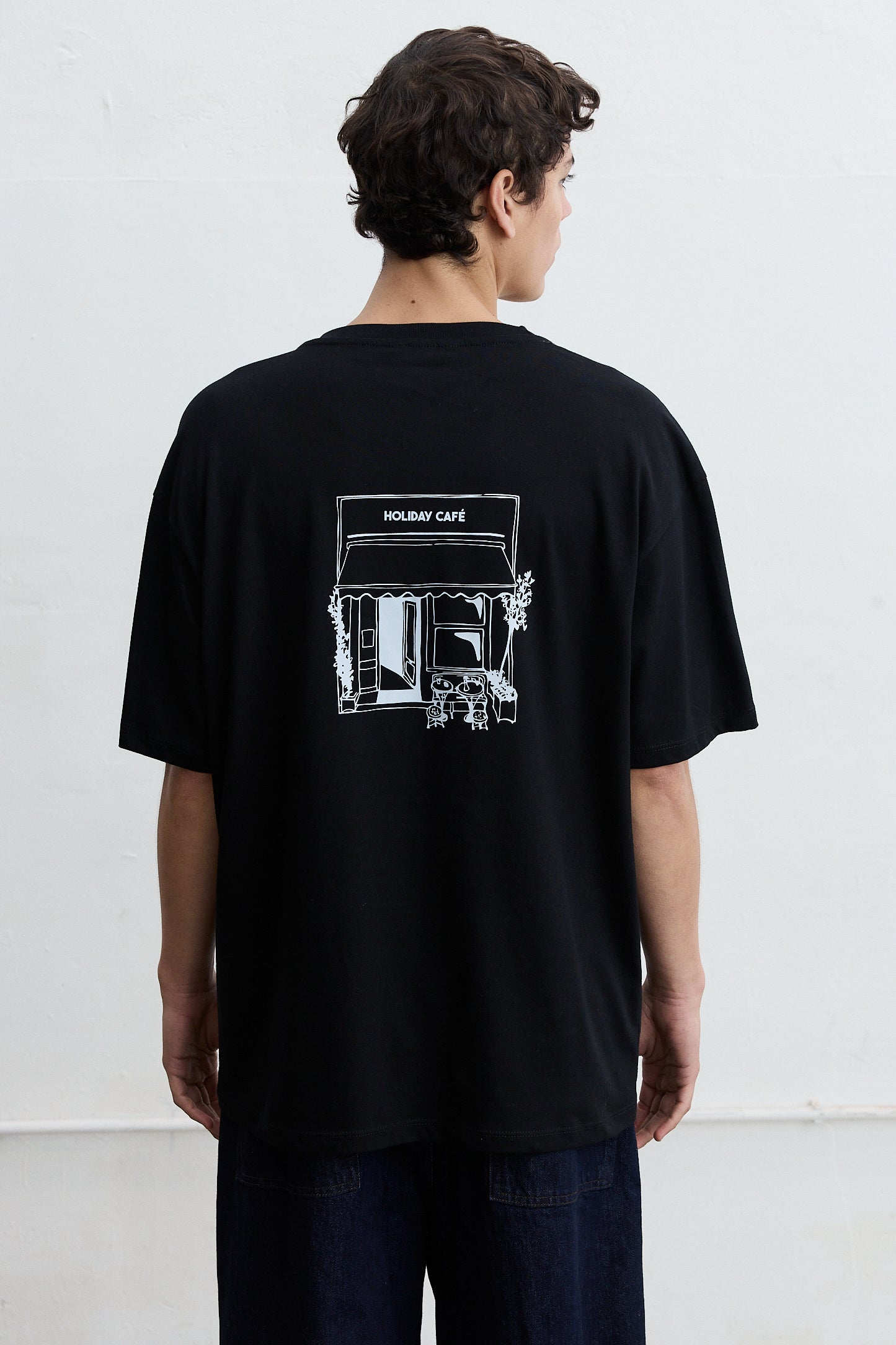 Remera oversize estampada Biel Holiday Cafe